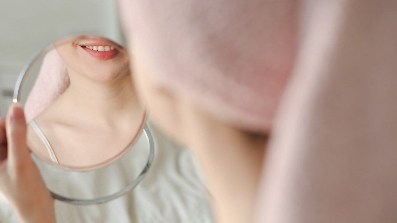 a woman wearing a white shirt
